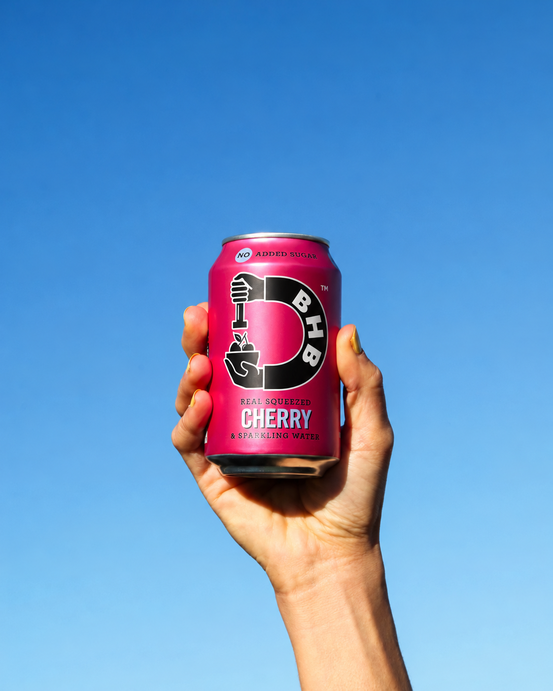 Cherry soda against a blue sky