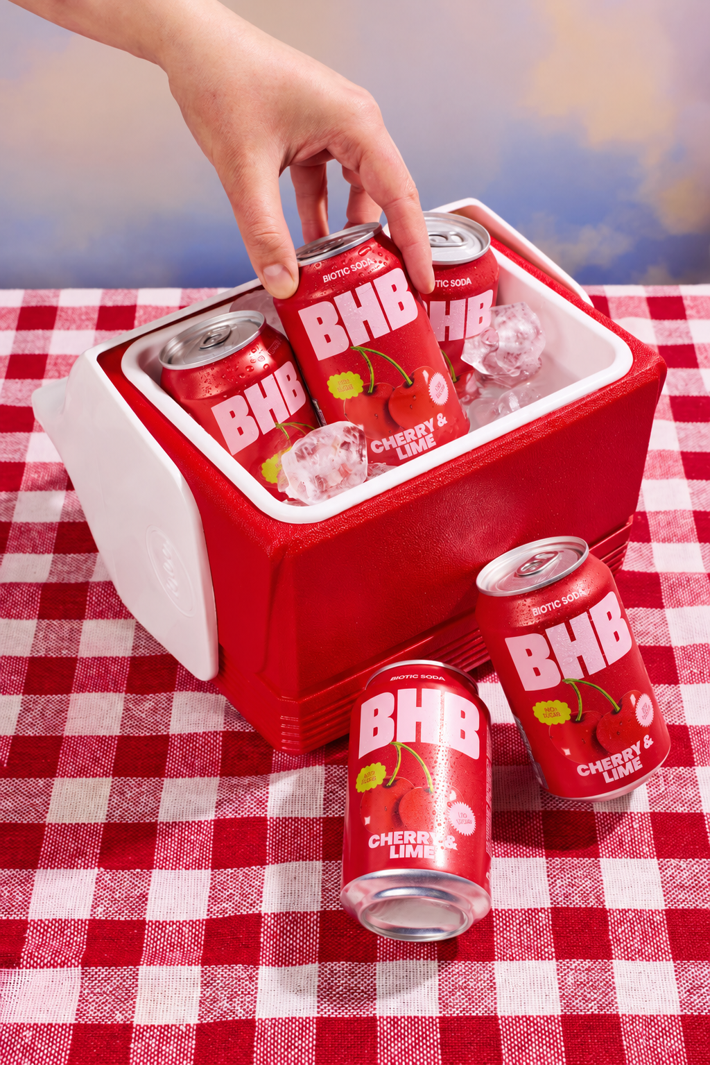 BHB Cherry and Lime cans chilled in a picnic cooler